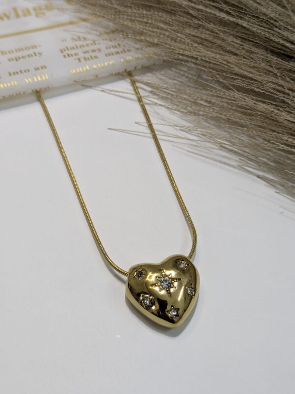 Golden heart with diamond